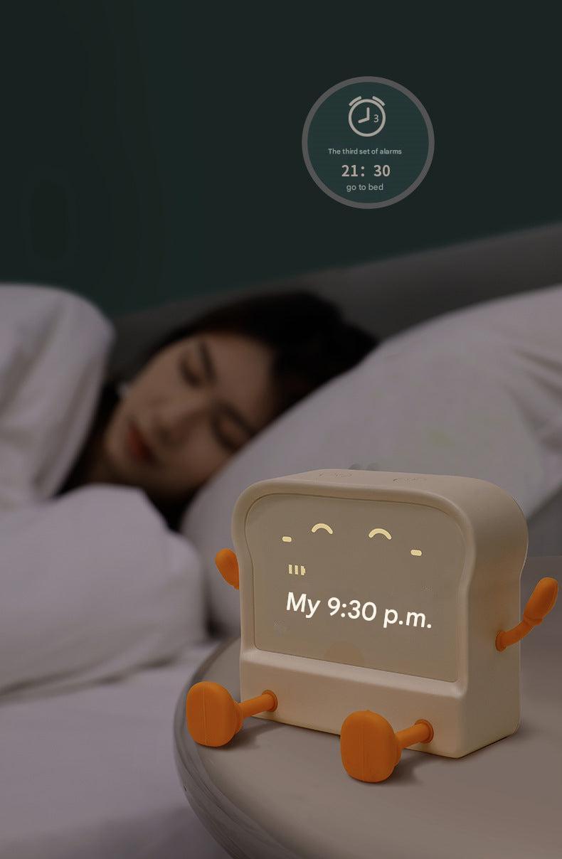 Alarm clock with glowing night light feature
