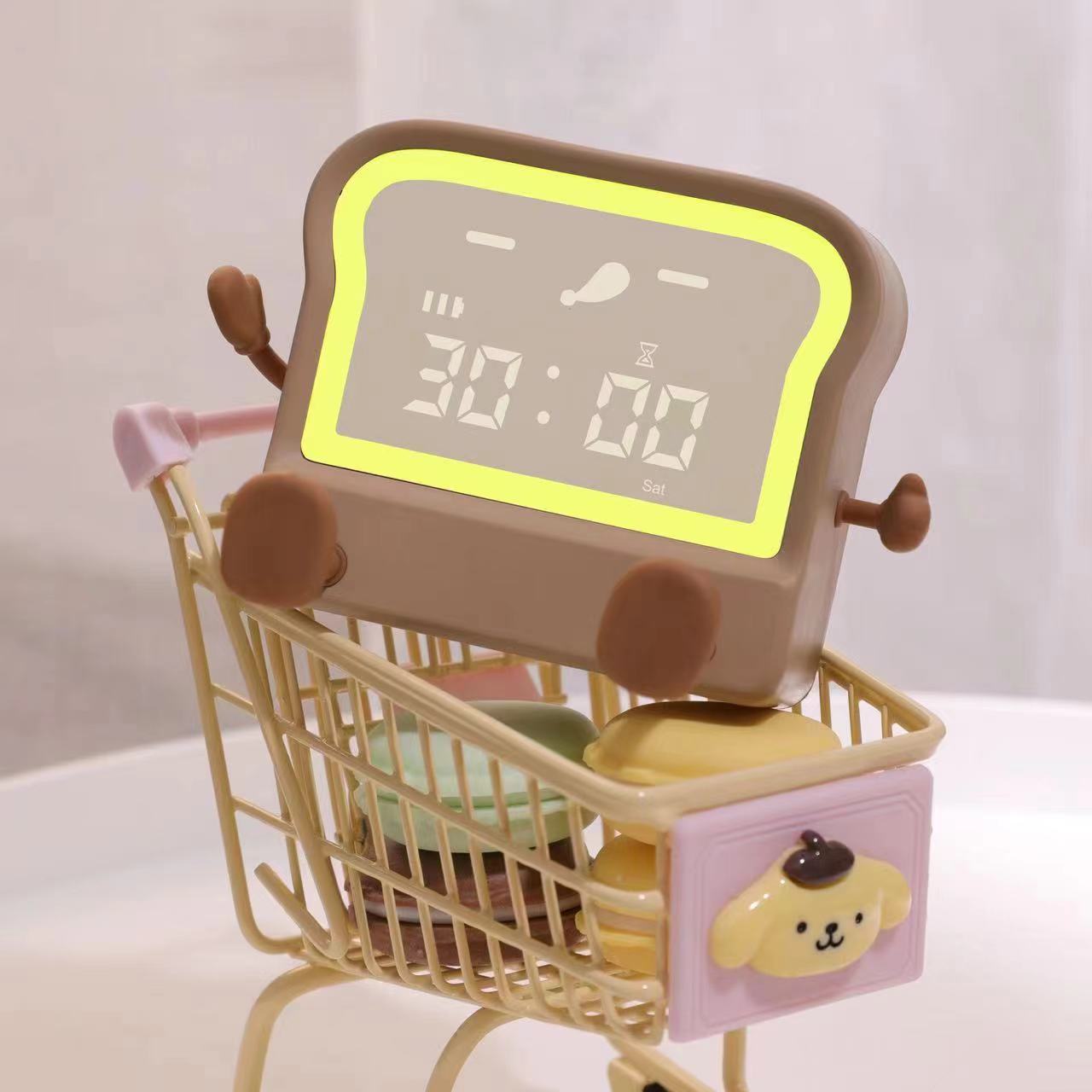 Alarm clock with glowing night light feature