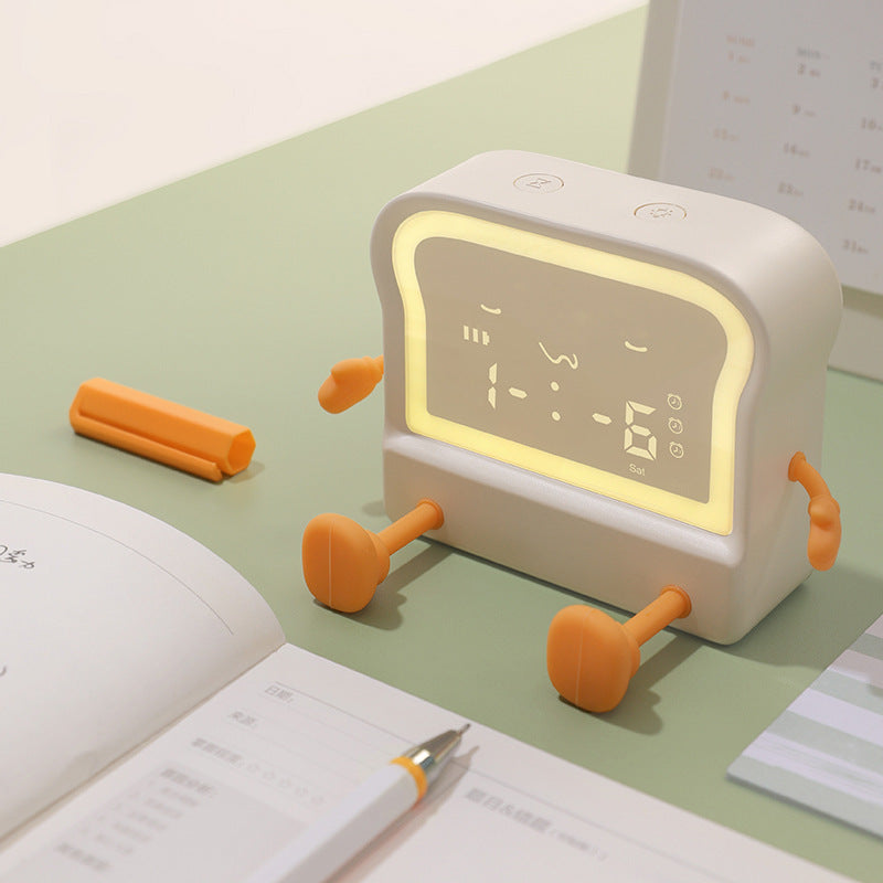 Alarm clock with glowing night light feature