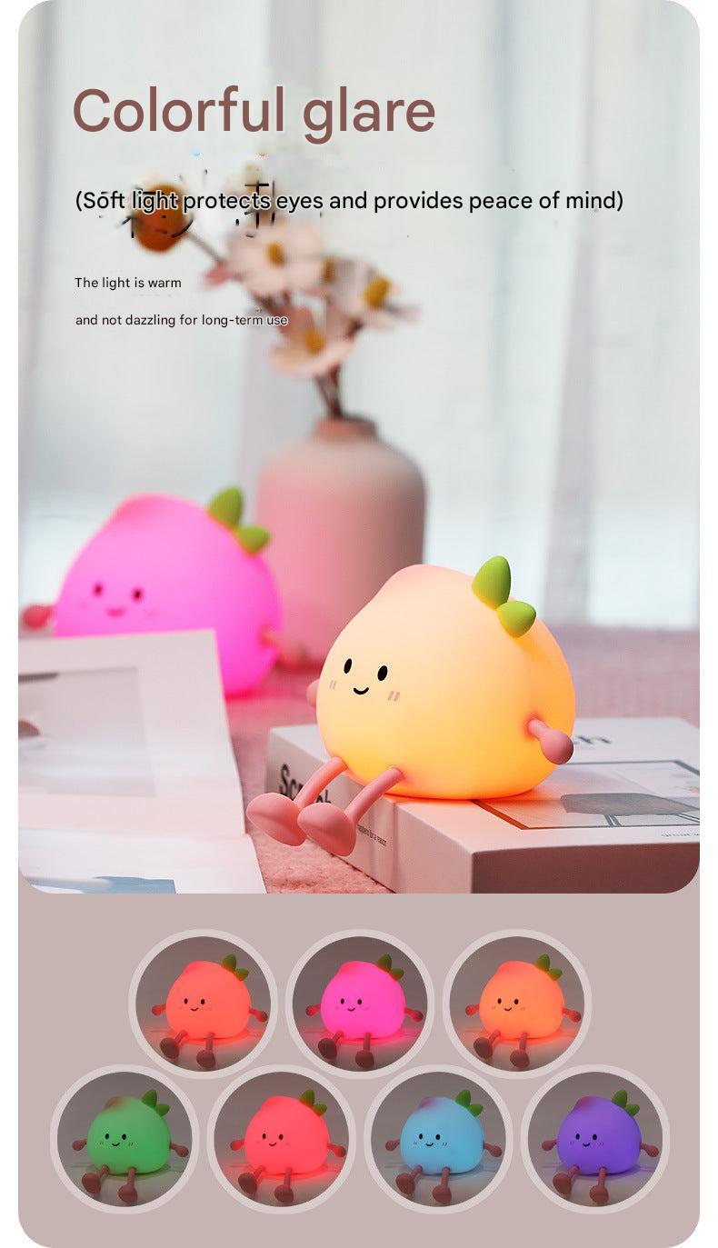 Multi-colour silicone night light with tap control
