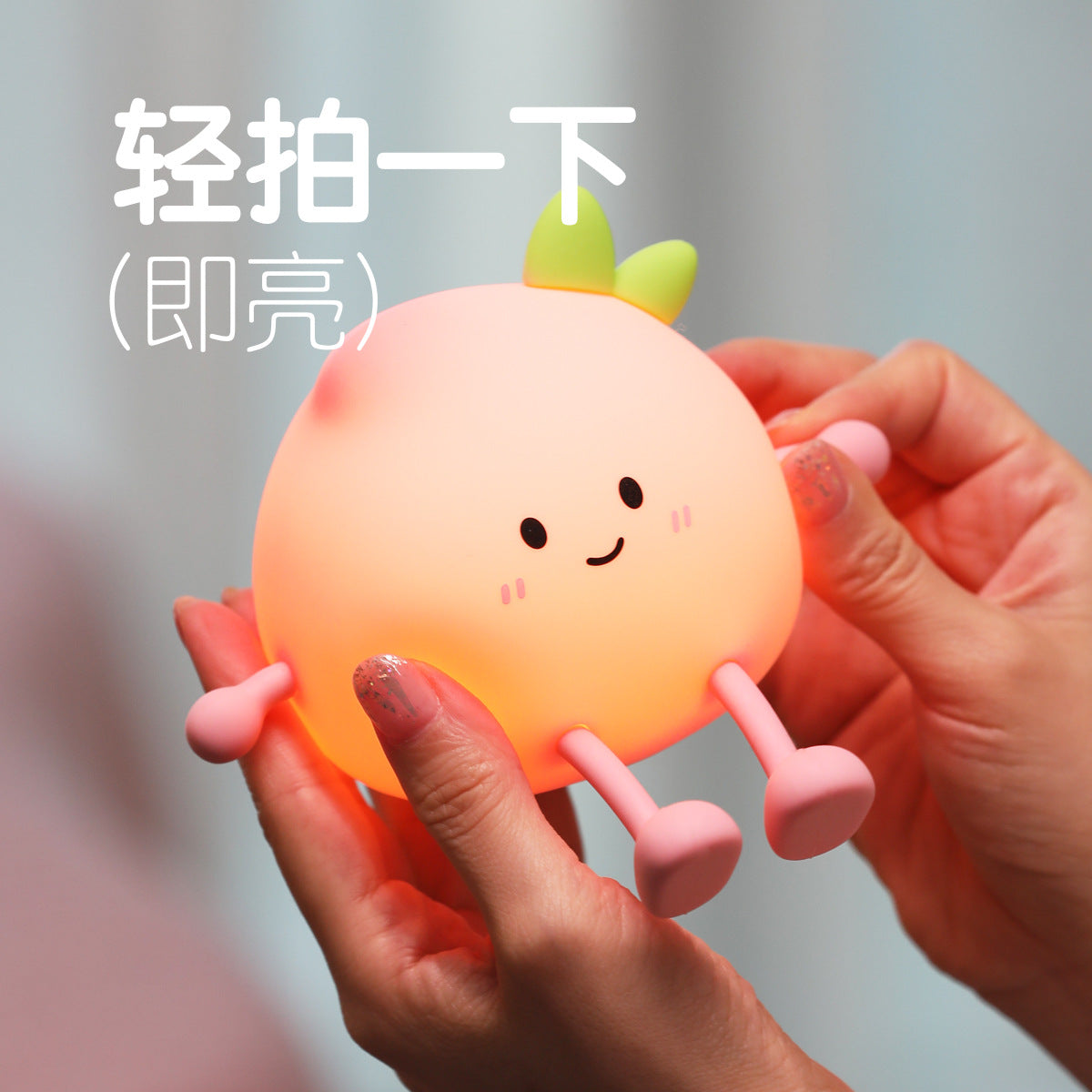 Child-friendly silicone night light displaying warm light