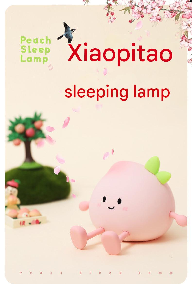 Multi-purpose night light with phone holder feature