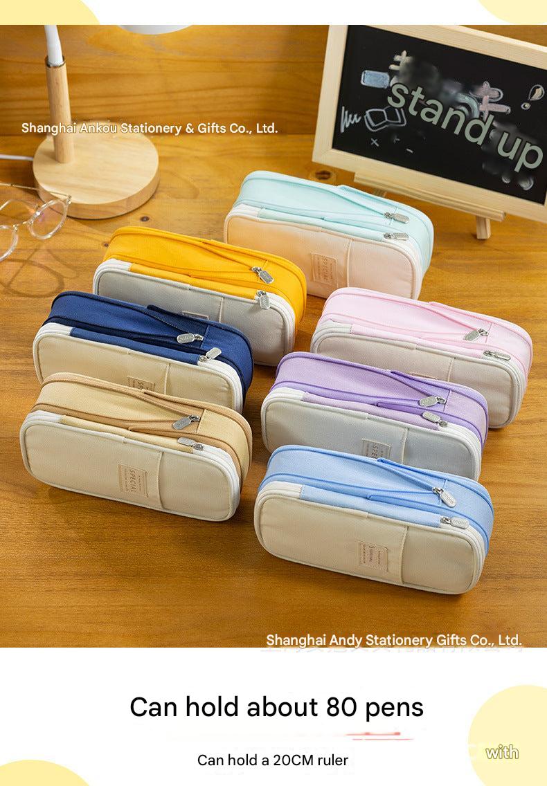 Angoo transforming pencil case in navy blue
