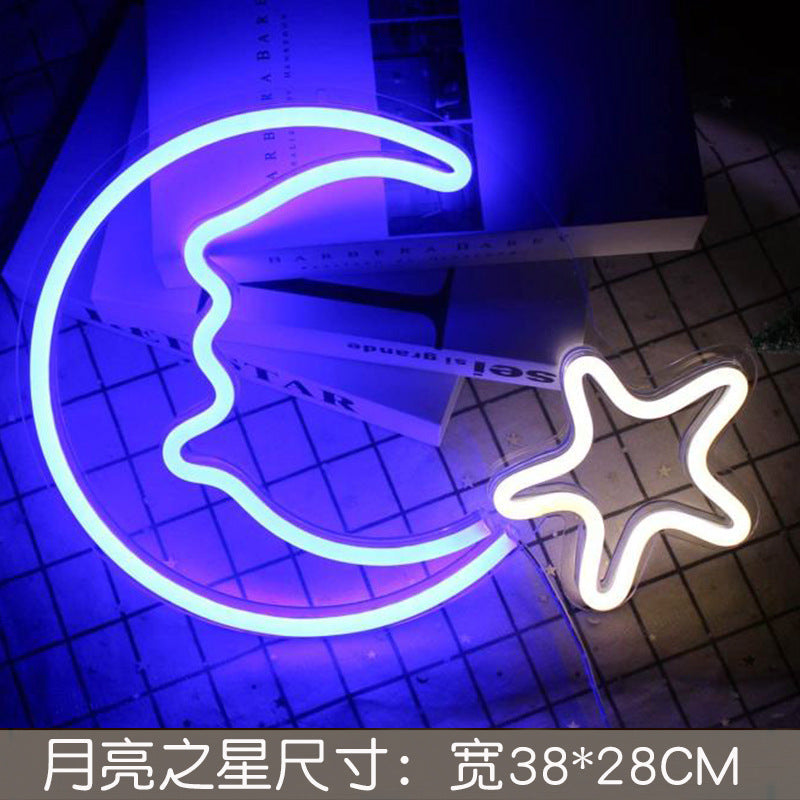 Neon sign with the word hello in bright colours