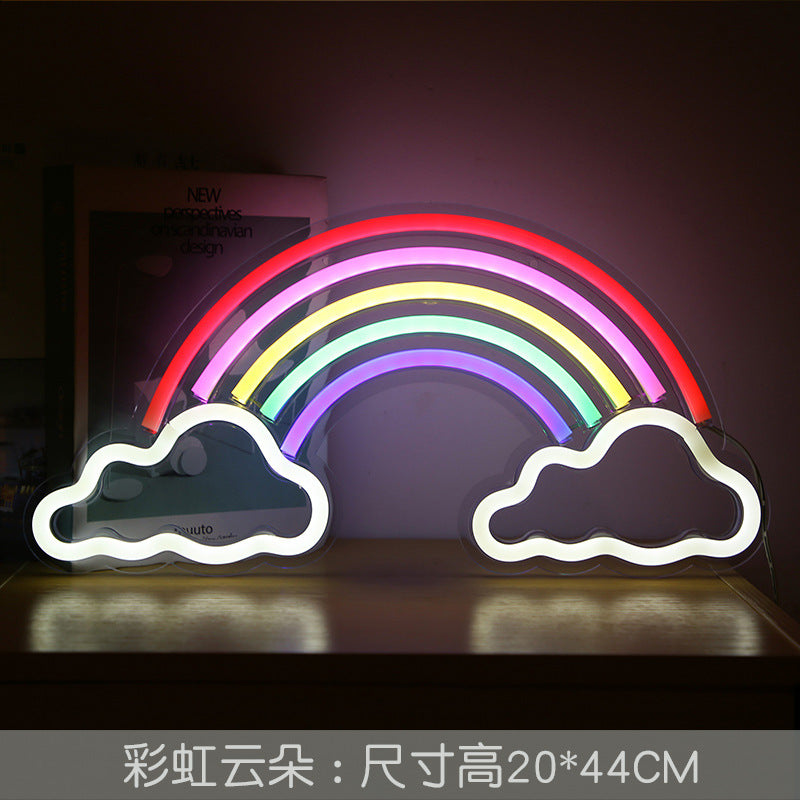 Neon sign with the word hello in bright colours