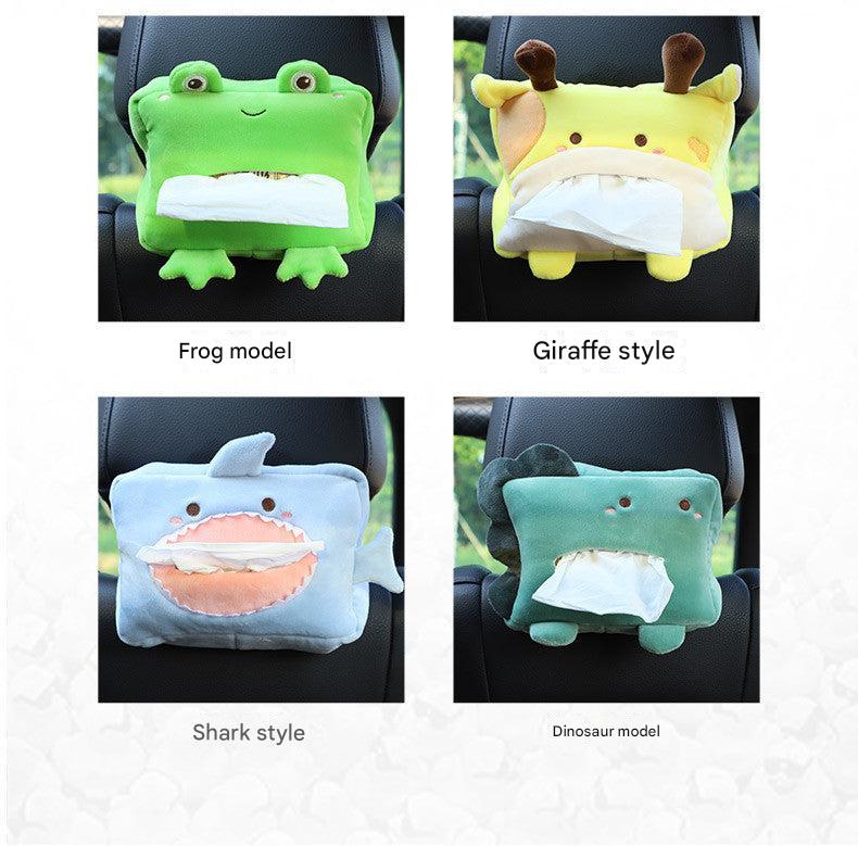 Plush lion tissue box dispenser in car interior