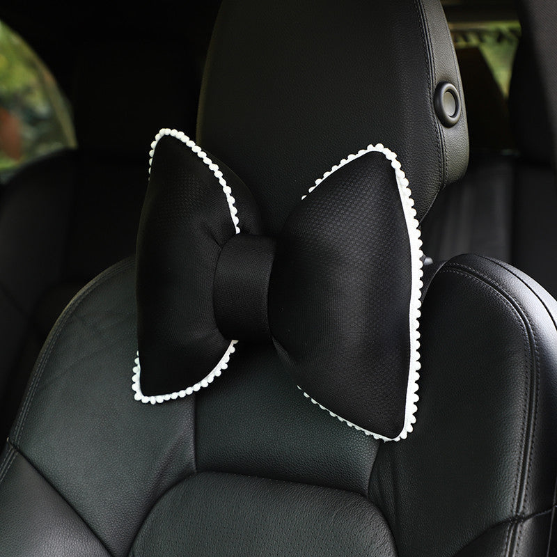 Plush car headrest cushion with camellia design