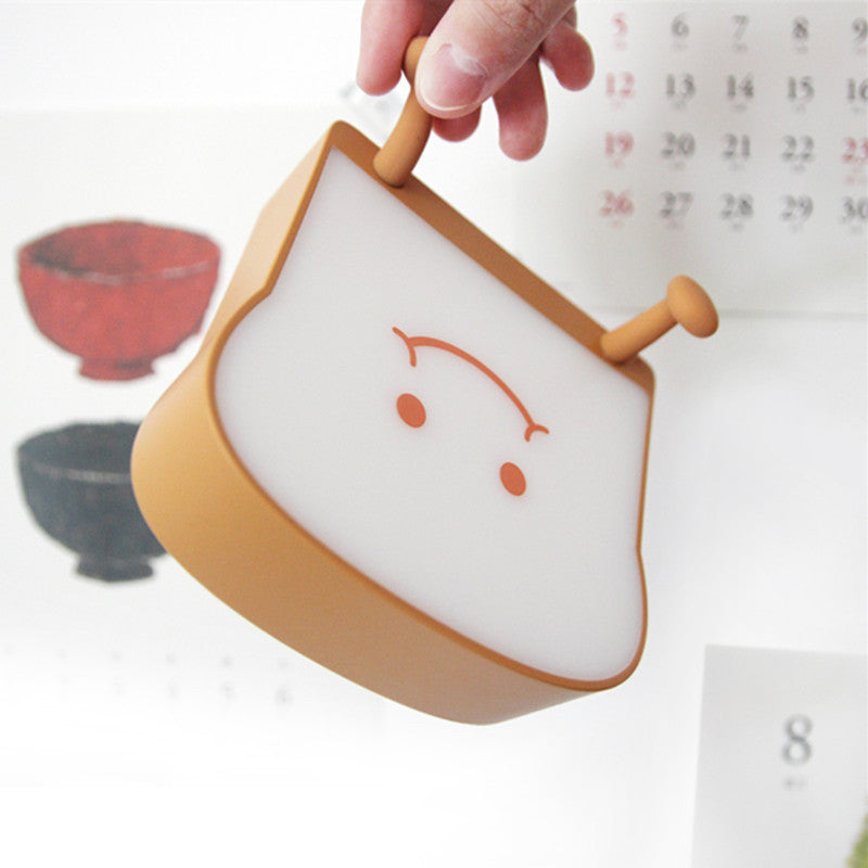 Cute Toast Bread Night Light in a cozy bedroom