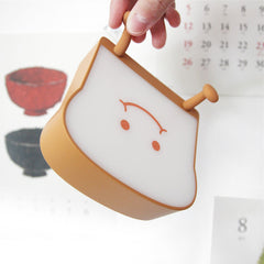 Cute Toast Bread Night Light in a cozy bedroom