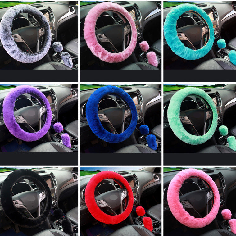 Red plush steering wheel cover accent in car