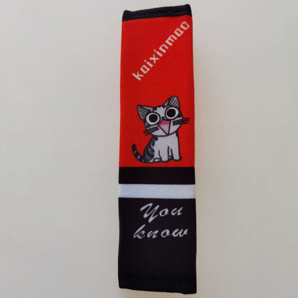 Fun grey cartoon seat belt pad in a car