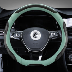 Fitting black steering wheel cover on a car