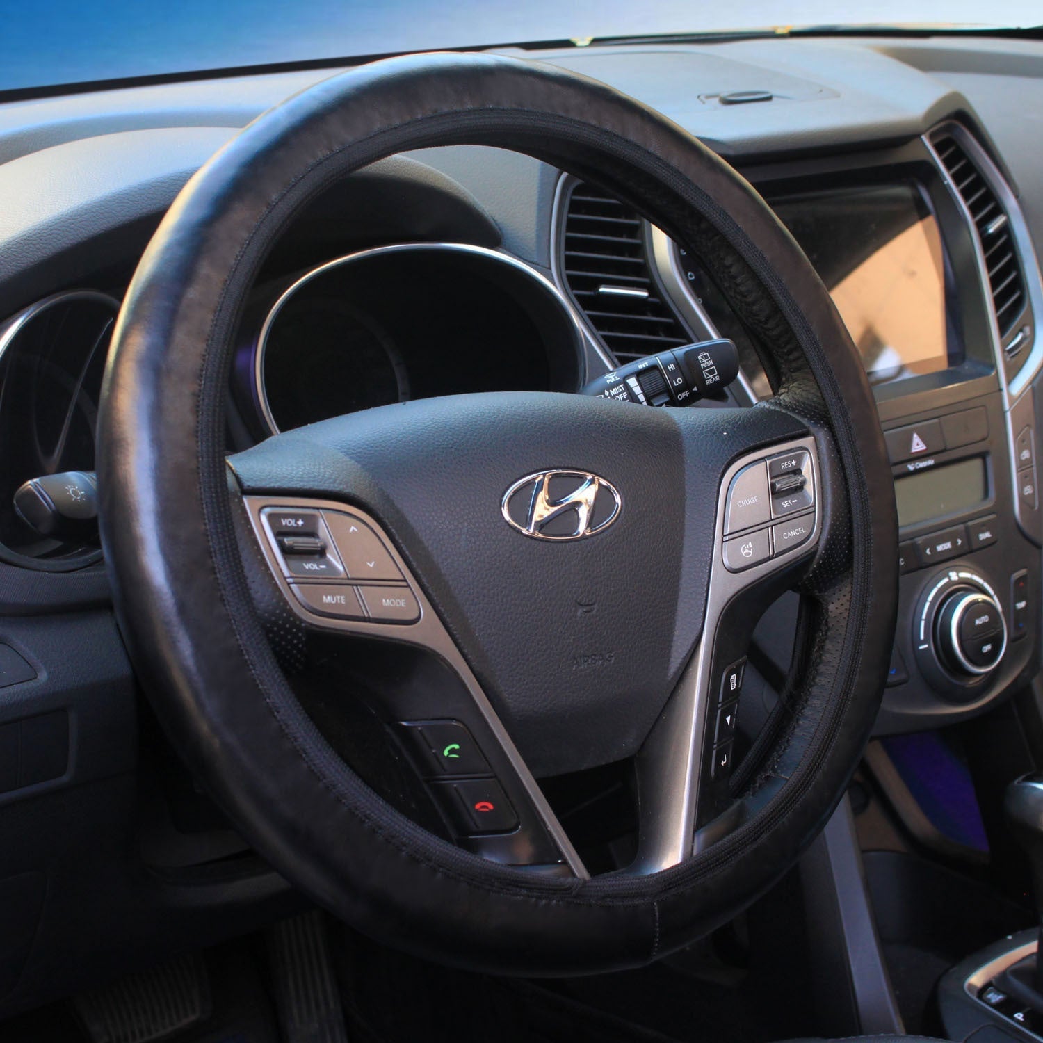 blue and purple steering wheel covers