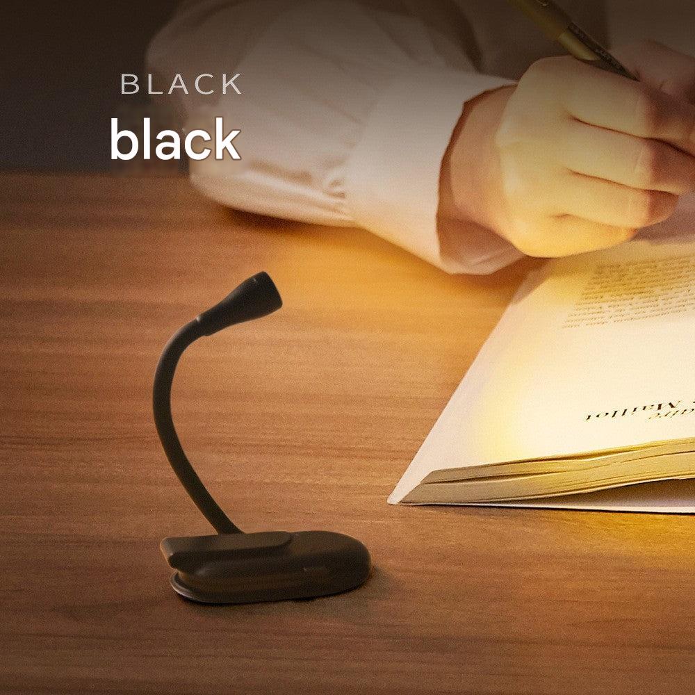 Compact LED desk lamp in modern workspace