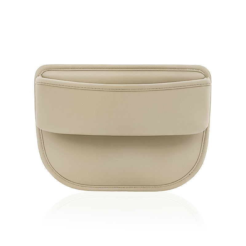 Image featuring beige leather car interior gap storage accessory