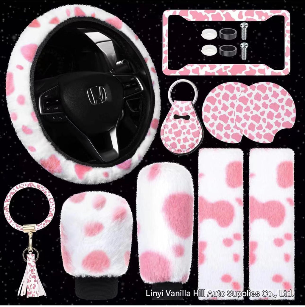 Car steering wheel cover in cow print design
