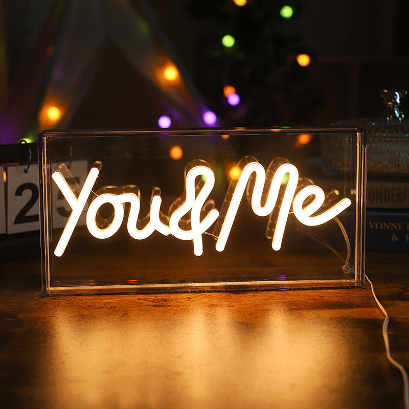 Neon Bliss LED shaped light displaying 'CHEERS'