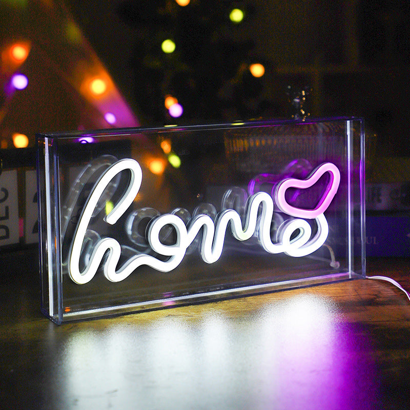 Neon Bliss LED shaped light displaying 'PEACE'