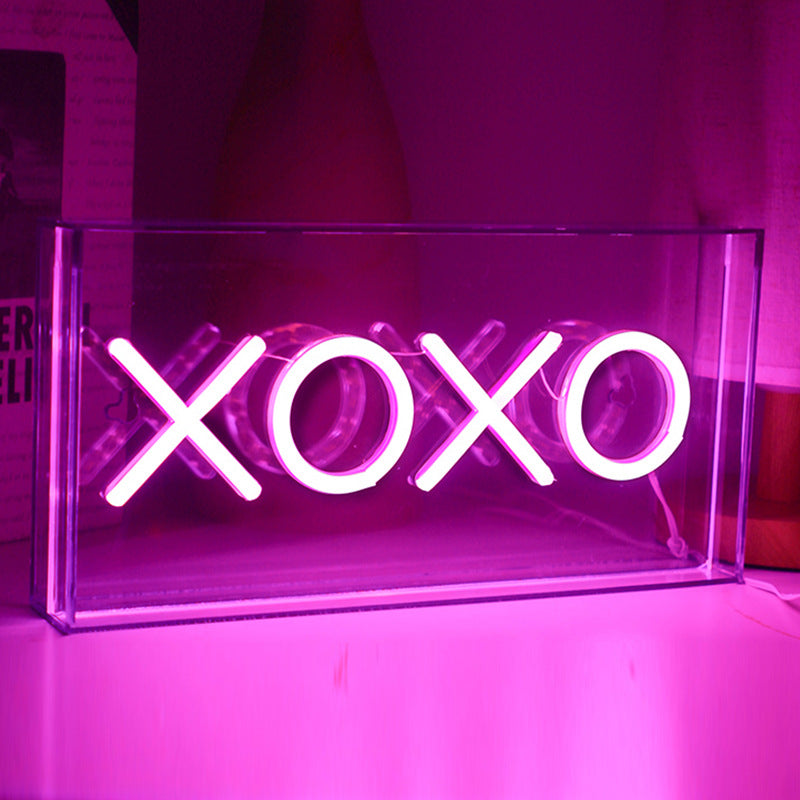 Neon Bliss LED shaped light displaying 'CHEERS'