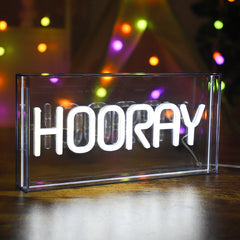 Neon Bliss LED shaped light displaying 'PEACE'