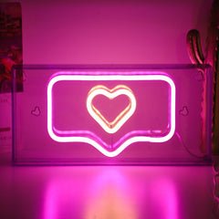 Neon Bliss LED shaped light displaying 'PEACE'