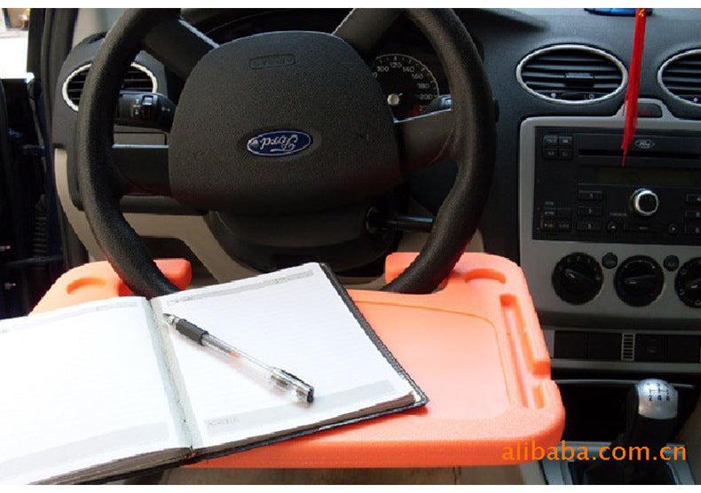 Compact steering wheel desk for work in the car
