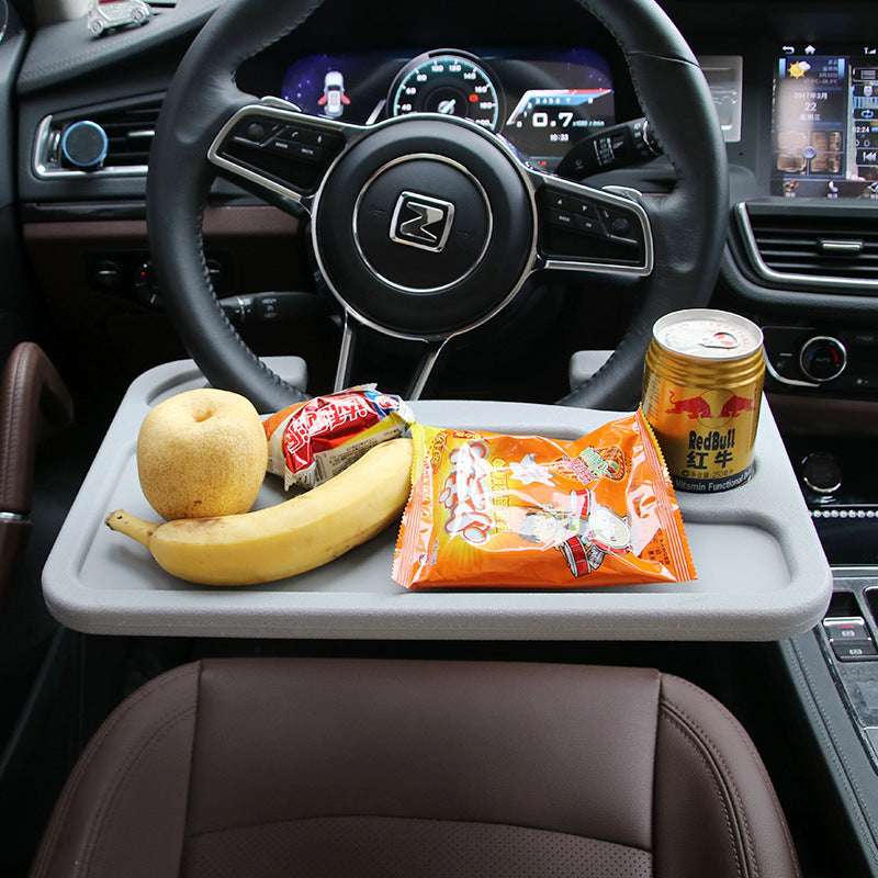 Compact steering wheel desk for work in the car