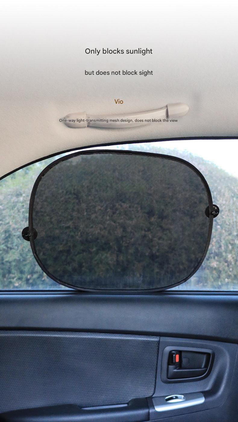 Interior view of car with installed mesh window shades