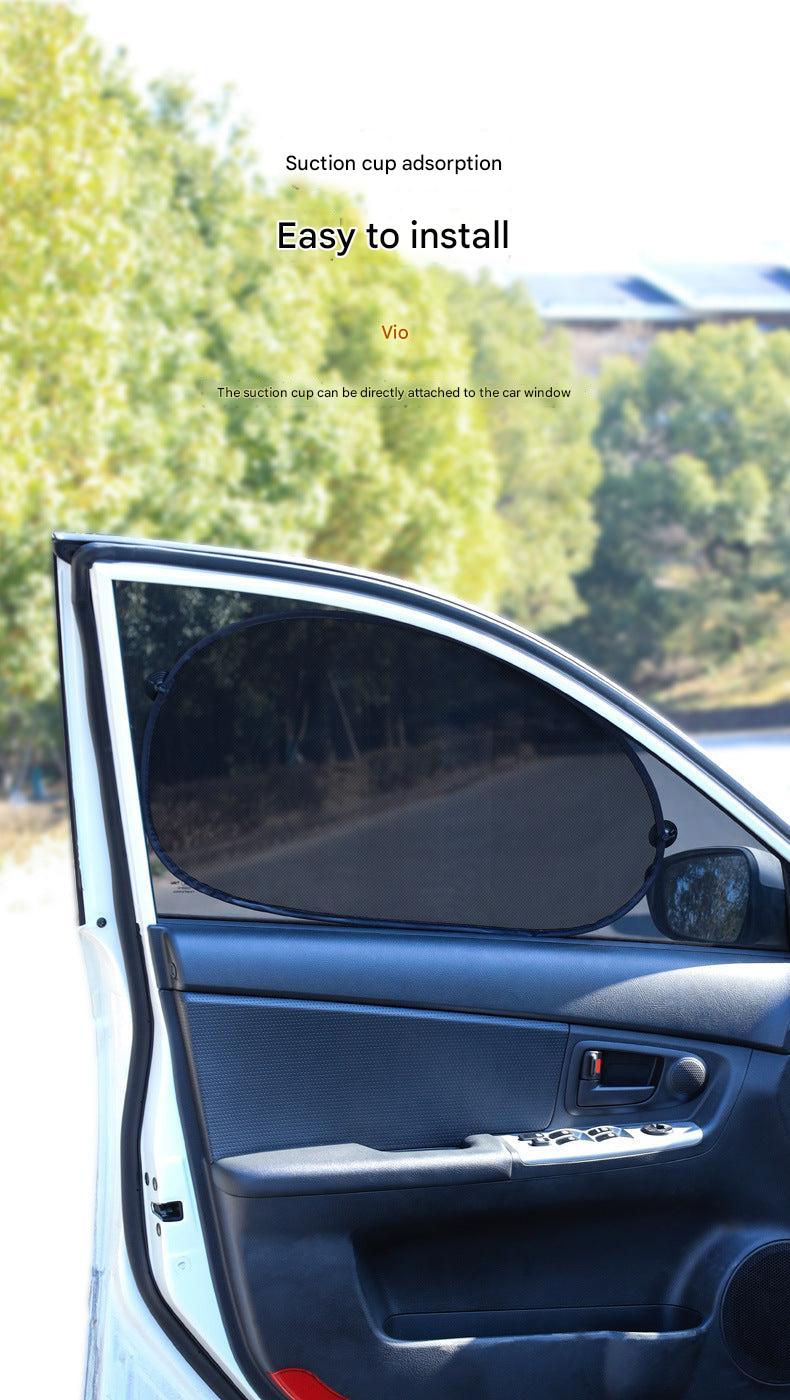 Rear car window with mesh sunshade installed