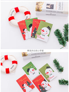 Multiple assorted Christmas cartoon notepads