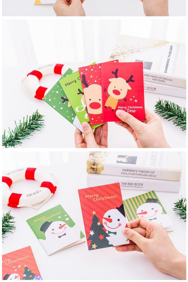 Cute Christmas-themed pocket notebook featuring Santa Claus