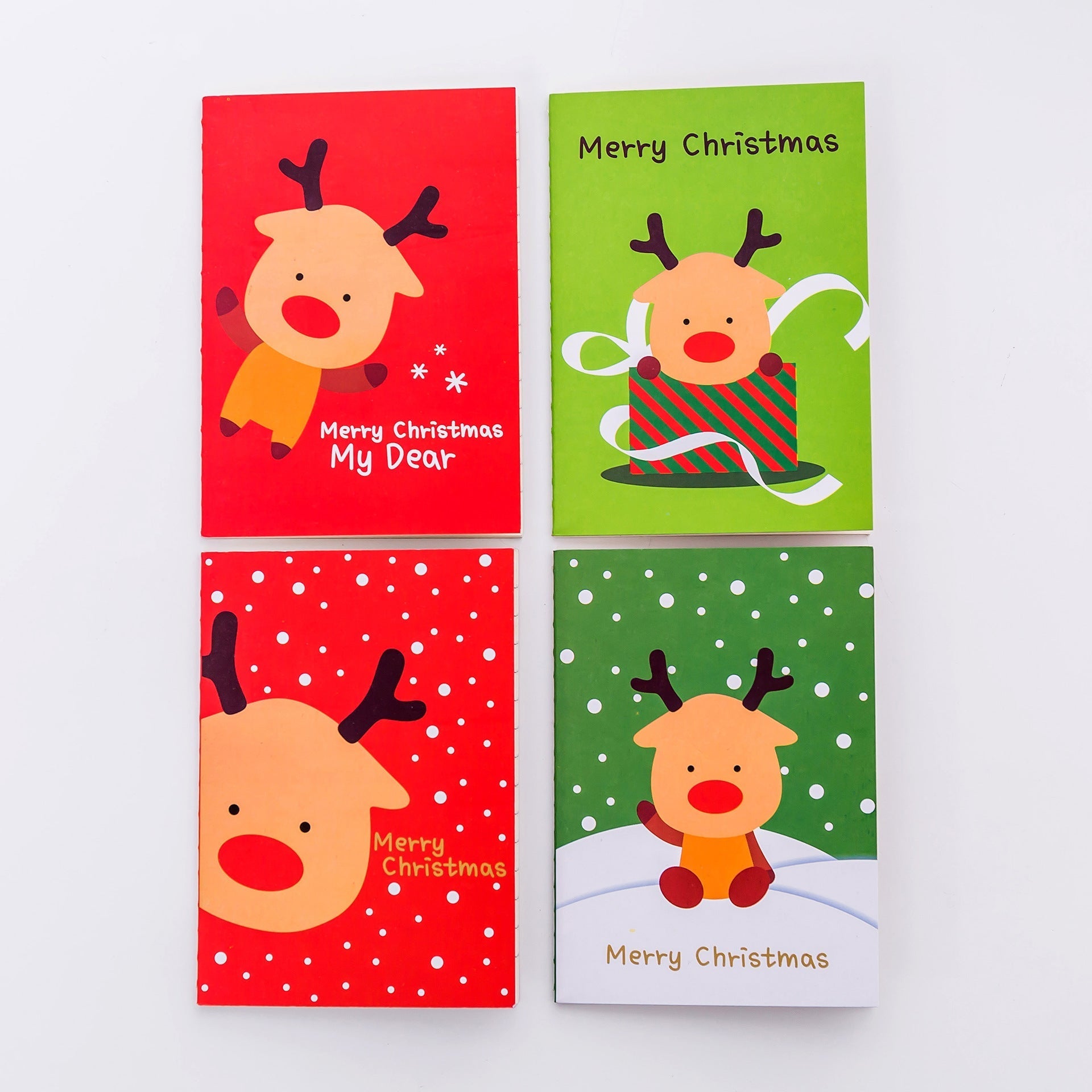 Holiday themed mini journals in various designs