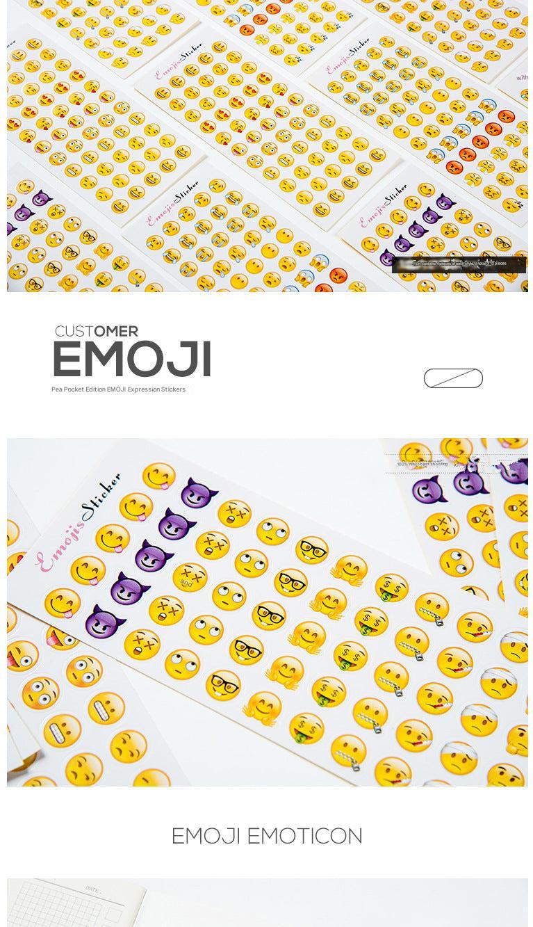 Flat lay of cute emoji stickers on design paper