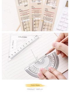 Ruler laid flat with craft supplies
