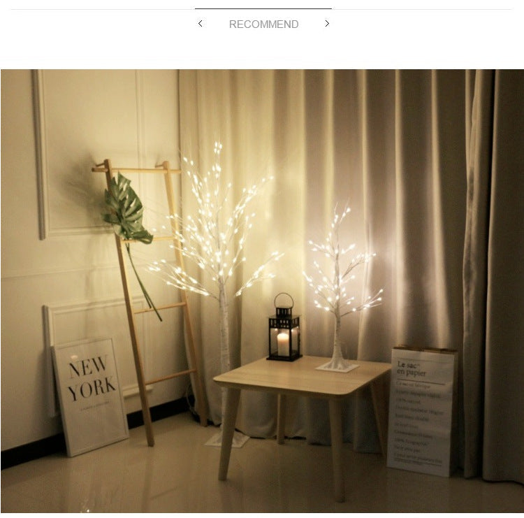 Tall LED birch tree light in festive setting