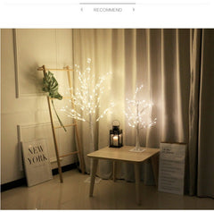 Tall LED birch tree light in festive setting