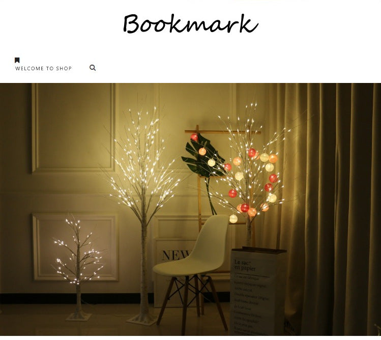 Tall LED birch tree light in festive setting