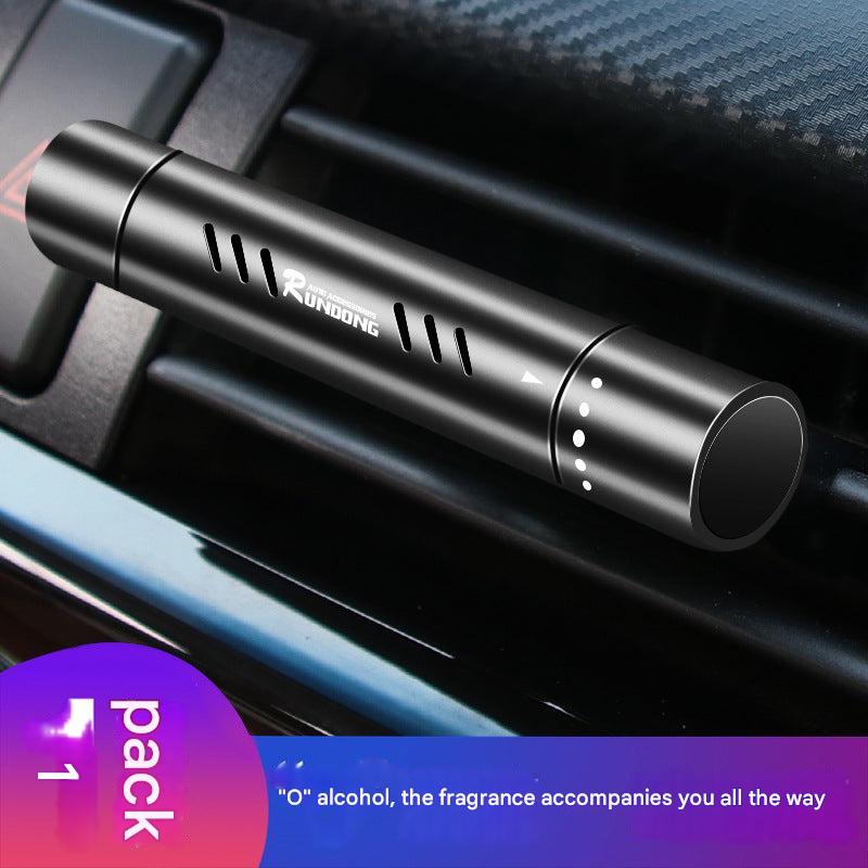 Clip attached to vehicle air vent displaying scent option