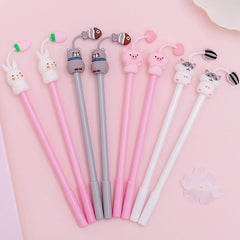 Close-up of cartoon animal gel pen showing the smooth writing tip