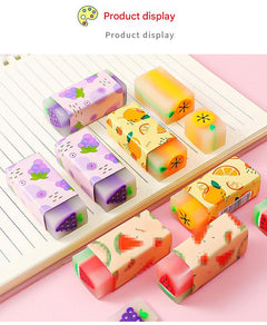 assorted fruit-themed erasers on a desk