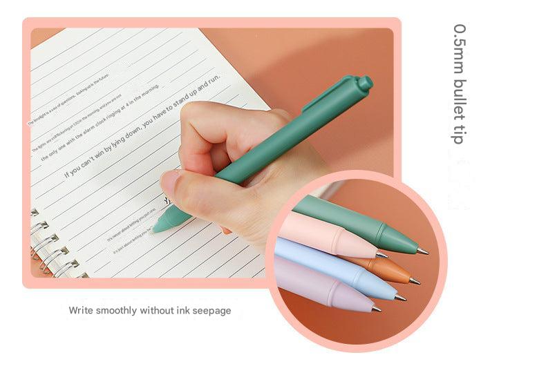 Macaron purple gel pen on writing paper