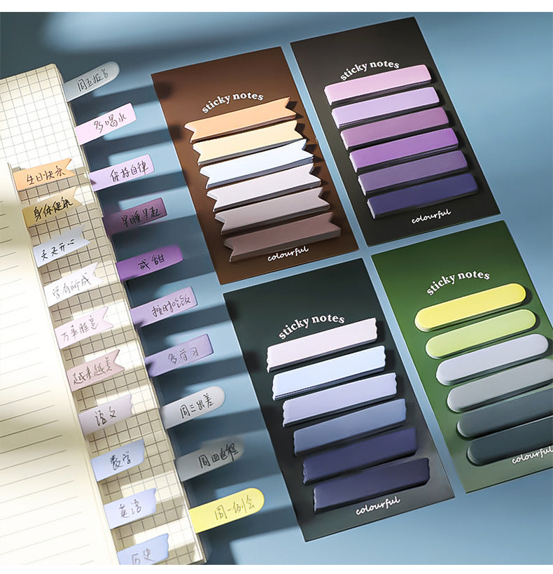 assorted colours of adhesive sticky notes displayed