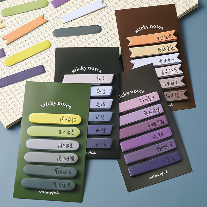 assorted colours of adhesive sticky notes displayed