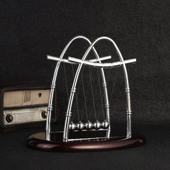 Modern Newton's Cradle in a gift box setting