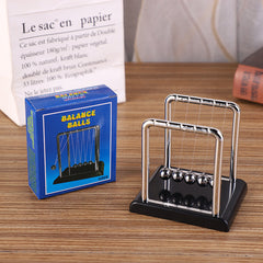Newton's Cradle desk toy showcasing motion