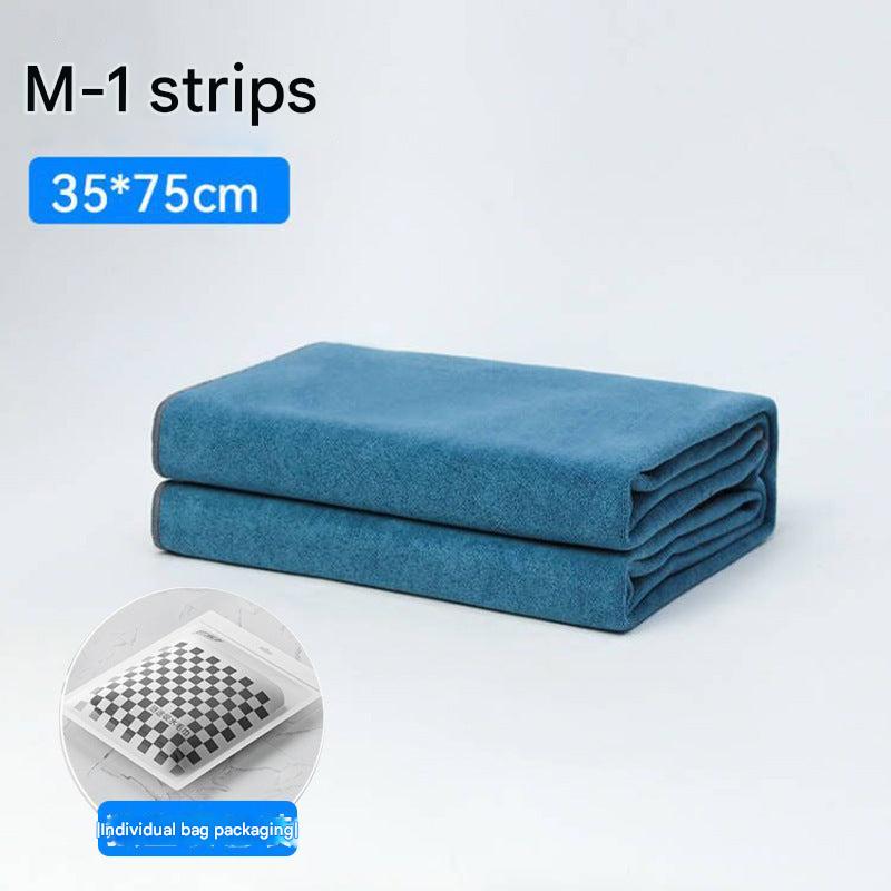 Microfiber car towel absorbing water
