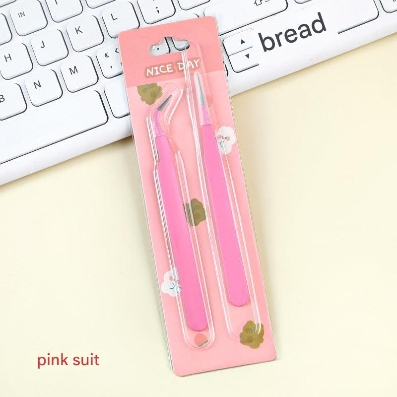 Craft tweezers in use with beads