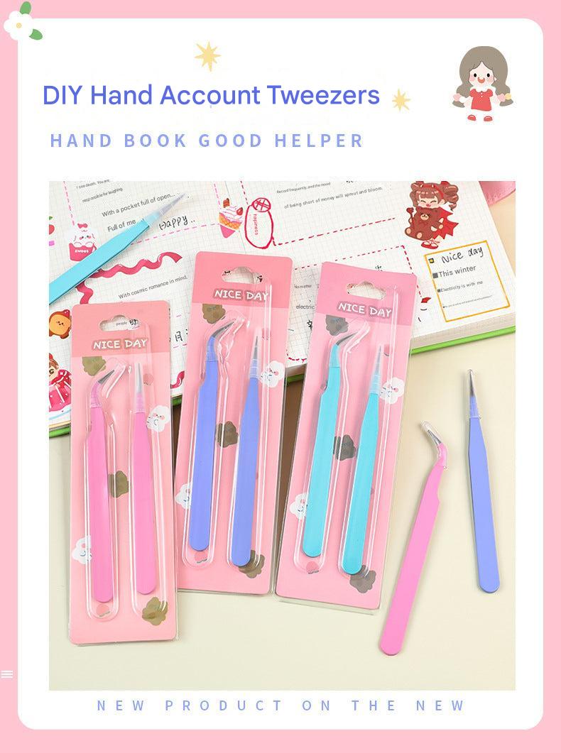 Craft tweezers holding paper with detail