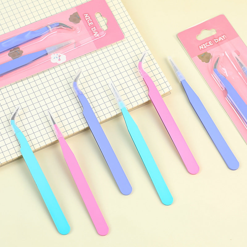 Craft tweezers in use with beads