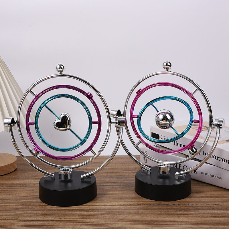 Electroplated desk ornament showing motion